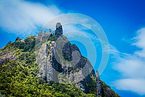 Mount Manaia dominating over green slopes of Whangarei Heads peninsula