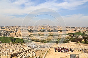Mount of Olives Jewish Cemetery and Jerusalem Old city cityscape panorama with Dome of the Rock with gold leaf and Al-Aqsa Mosque
