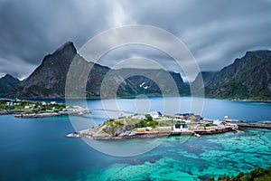 Mount Olstind above the Sakrisoy fishing village, Lofoten, Norw