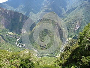 Mount putucusi at urubamba valley seen from machu picchu photo