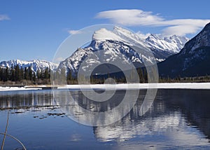 Mount Rundle reflected in the icy waters of Vermillion Lakes