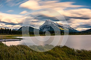 Mount Rundle in Vermillion lake with wooden pier on sunset at Banff national park