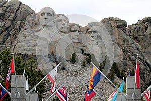Mount Rushmore with Flags in Foreground