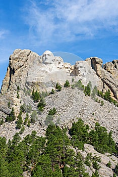 Mount Rushmore natonal memorial, USA. Sunny day, blue sky. Vertical layout.