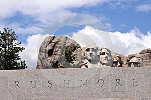 Mount Rushmore with text in granite