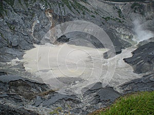 Mount Tangkuban Parahu crater, surrounded by black sand typical of volcanoes, Lembang west Java