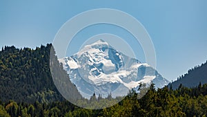 Mount Tetnuldi rises above the Great Caucasian Range in the upper Svaneti in Georgia, Mountain Landscape