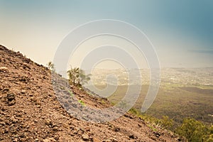 Mount Vesuvius: volcano slopes with a view over Naples Bay on a foggy day