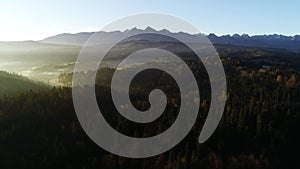 Mountain aerial, epic view. Aerial view of mountain landscape and morning fog.