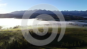 Mountain aerial, epic view. Aerial view of mountain landscape and morning fog.