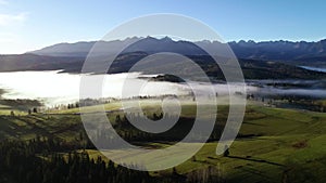 Mountain aerial, epic view. Aerial view of mountain landscape with morning fog.