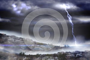 Mountain against sky with lightning