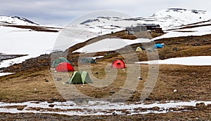 Mountain arctic tent camp and cottage.