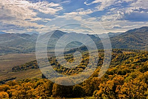 The mountain autumn landscape with colorful forest. Golden autumn in the forest. Caucasus mountains, Adygea, Russia