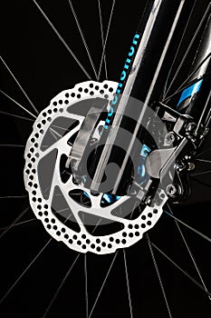 mountain bicycle disk brake system on dark background