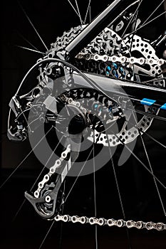 mountain bicycle gears system on dark background