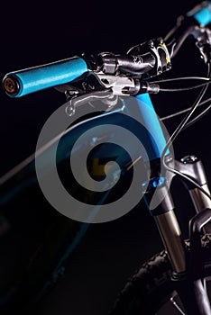 Mountain bicycle photography in studio, bike frame parts, handle bar and brakes