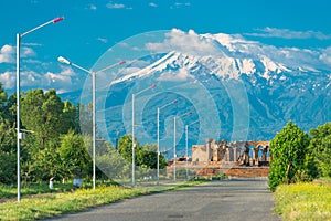 Mountain Big Ararat with a snow-capped peak and the ruins of Zvartnots temple, a landmark