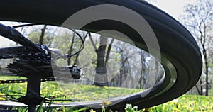 Mountain bike crash, spinning wheel, closeup