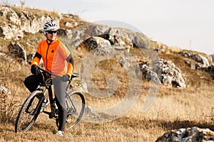 Mountain Bike cyclist riding Meadow track