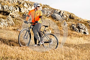 Mountain Bike cyclist riding Meadow track