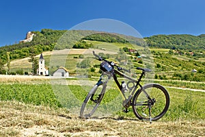 Mountain bike in green landscape