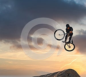 Mountain bike, jump and sport with mockup of a man athlete with energy and speed in nature. Healthy sports person with