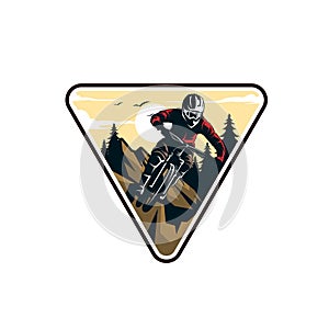 Mountain bike logo design. Extreme downhill biker vintage logo illustration vector