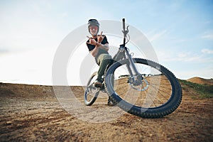 Mountain bike, portrait and with man shaka hand sign on path for extreme sports, happiness and excited mockup. Dirt