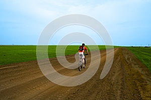 Mountain bike race on ground road