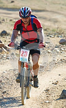 Mountain bike racer in desert