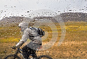 Mountain bike rider in rain