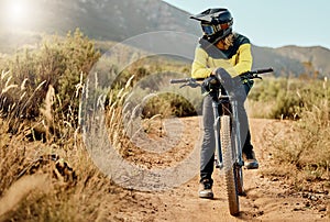 Mountain bike, sports and nature man in fitness adventure, travel and journey in Australia dirt path for marathon, race