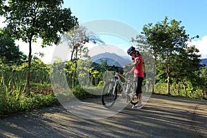 Mountain bike on sunrise forest trail