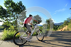 Mountain bike on sunrise forest trail