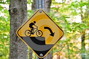 Mountain bike trail, Sudden Drop warning sign, Black and Yellow
