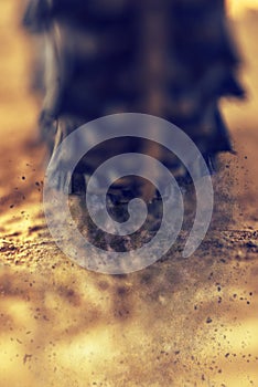 Mountain bike wheel close up with dirt dust particles