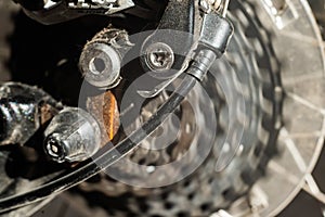 Mountain bike wheel gears closeup. Brake system. Close-up. Shifting speeds.