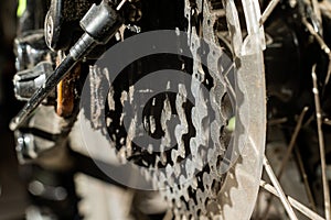 Mountain bike wheel gears closeup. Brake system. Close-up. Shifting speeds.