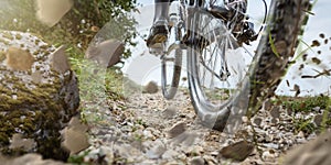 Mountain bike wheel on a gravel track