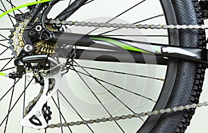 Mountain bike wheel and reverse gear on white background