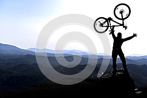 Mountain biker celebrates