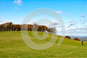 Cyclist offload heading up a hill photo