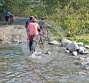 Mountain biker and creek