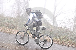 Mountain biker in heavy weather