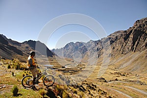 Mountain Biker Looking at Valley photo