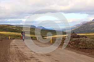 Mountain biker traveling in the mountains