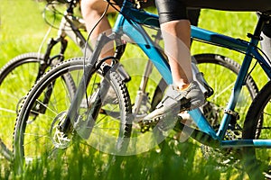 Mountain bikers wearing cycling shoes closeup