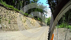 Mountain biking along dirt road in Bieszczady, Poland