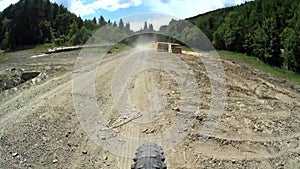 Mountain biking along dirt road in Bieszczady, Poland